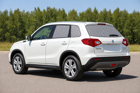 Suzuki Vitara with silver quilted Touring Set screens covering rear windows and clear front glass