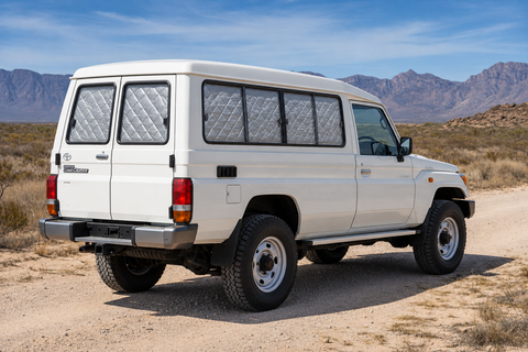 Two-door LandCruiser 75/78 Troop Carrier with silver Touring screens