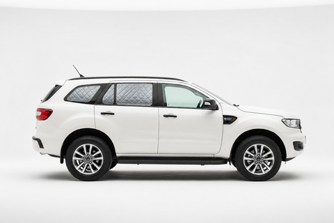 White Ford Everest side view with silver quilted rear Touring Set screens and clear front glass.